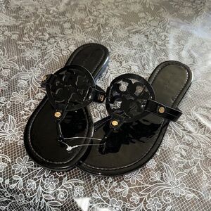 Tory Burch Black Sandals with Gold Accents